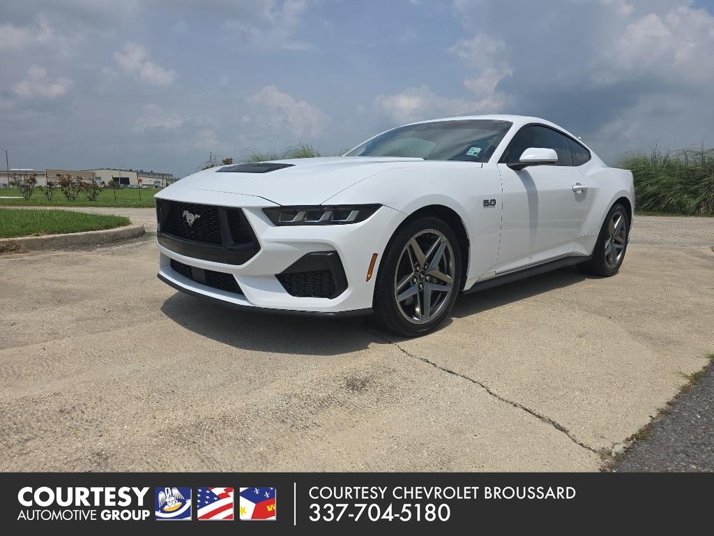 2024 Ford Mustang GT in White — front three-quarter view