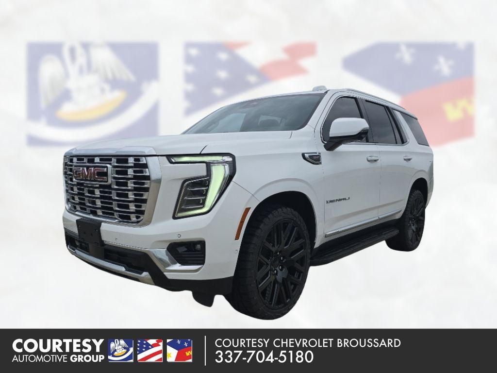 2025 GMC Yukon Denali in Summit White — front three-quarter view