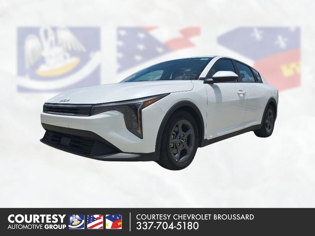 2025 Kia K4 LXS in White — front three-quarter view